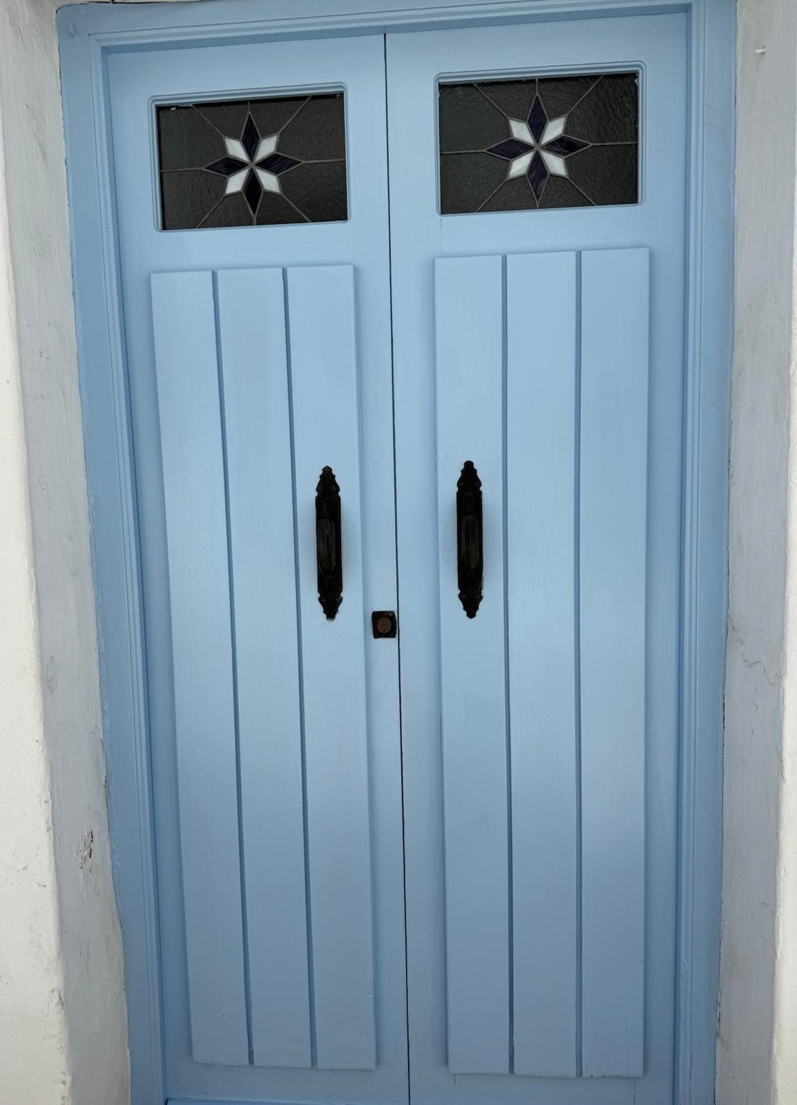 Puerta de entrada de madera maciza de pino